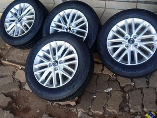 15 inch kia rio mags and tires available leave your whatsapp number if interested.
