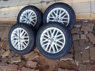 15 inch kia rio mags and tires available leave your whatsapp number if interested.