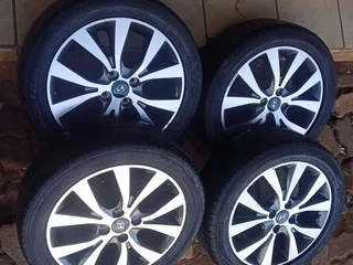 16 inch Hyundai mags and tires available.pcd 4x100. leave your whatsapp number if interested.