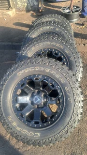 285/70R17 cooper discoverer tires with mags for backkie, leave your whatsapp number if interested.