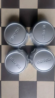 Isuzu bakkie center caps. leave your whatsapp number if interested.