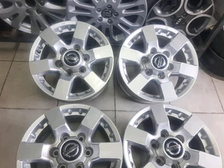 A set of 16 inche nissan np300 hardbody mags leave your whatsapp number if interested.