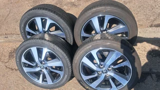 16 inche toyota mag rims 4x100 pcd and tires 195 50 r16 leave your whatsapp number if interested.