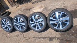 16 inche toyota rims 4x100 pcd and 195 50 r16 tires. leave your whatsapp number if interested.