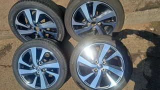 16 inche toyota rims 4x100 pcd and 195 50 r16 tires. leave your whatsapp number if interested.