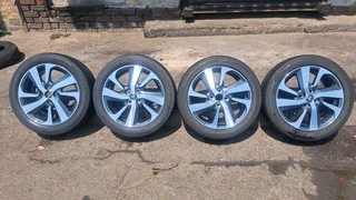 16 inche toyota rims 4x100 pcd and 195 50 r16 tires. leave your whatsapp number if interested.
