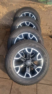 Toyota lengend 50 mags and 265/60R18 dunlop tires. leave your whatsapp number if interested.