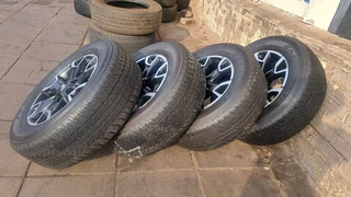 18 inche Toyota lengend 50 mags and 265/60R18 tires. leave your whatsapp number if interested