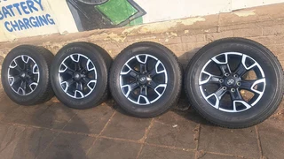 18 inche Toyota lengend 50 mags and 265/60R18 tires. leave your whatsapp number if interested