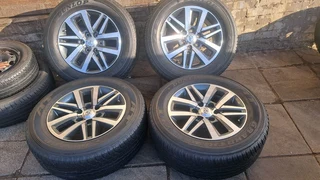 Toyota Dakar, Gd6, Fortuner mags &amp; Dunlop tires 18. Leave your whatsapp number if interested.