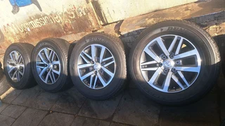 Toyota Dakar, Gd6, Fortuner mags &amp; Dunlop tires 18. Leave your whatsapp number if interested.