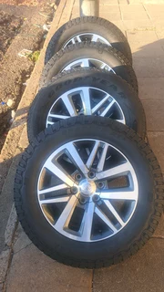 Toyota Hilux Dakar/Fortuner mags &amp; 265/65R18 General grabber tires. Leave your whatsapp number