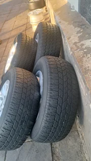 Toyota Hilux rims with 265/65R17 tires. leave your whatsapp number if interested for follow-up.