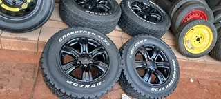 17 Inch Ford Ranger mag rims with 265/65R17 Dunlop Grandtrek tires of 92 threadleft.