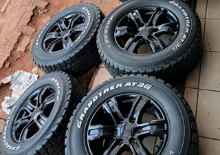 17 Inch Ford Ranger mag rims with 265/65R17 Dunlop Grandtrek tires of 92 threadleft.