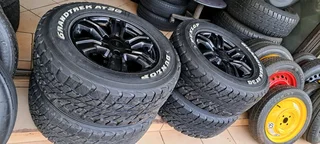 17 Inch Ford Ranger mag rims with 265/65R17 Dunlop Grandtrek tires of 92 threadleft.