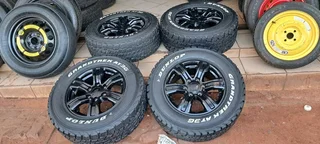 17 Inch Ford Ranger mag rims with 265/65R17 Dunlop Grandtrek tires of 92 threadleft.