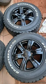 17 Inch Ford Ranger mag rims with 265/65R17 Dunlop Grandtrek tires of 92 threadleft.