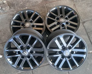 17 inch Toyota Hilux/ Fortuner black Twinspoke for sale. Leave your whatsapp number if interested