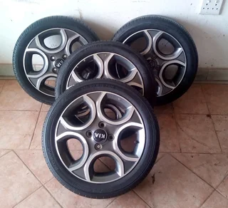  15-inch kia mag rims with 175/65R15 tires. Leave your whatsapp number if interested.