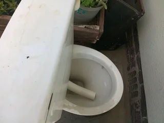 Toilet with all pipes