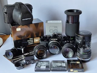 Olympus OM1n 35mm SLR Camera - 7 Lenses - Accessories