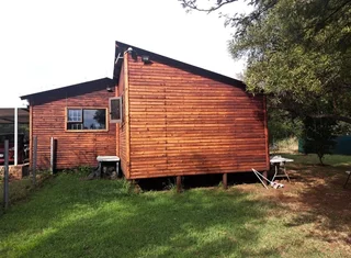 Cosy Log Cabin on a small holding