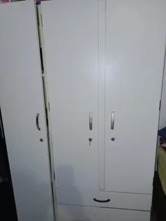White three door cupboard very spacious / Only serious buyers