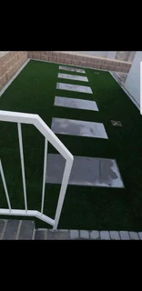 Paving And Artificial Turf Grass
