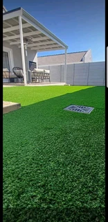 Artificial grass and paver