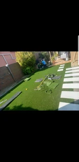 Artificial grass and paver