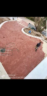 Artificial grass and paver