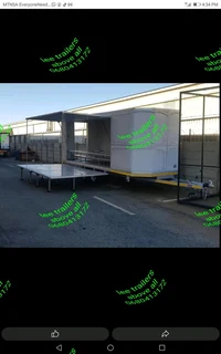 Mobile stage trailers for functions
