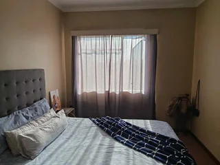 A   semi furnished  room to rent in a 3 bedroom apartment in milnerton center point