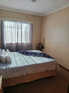 A   semi furnished  room to rent in a 3 bedroom apartment in milnerton center point