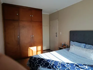 A   semi furnished  room to rent in a 3 bedroom apartment in milnerton center point