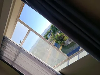 A   semi furnished  room to rent in a 3 bedroom apartment in milnerton center point