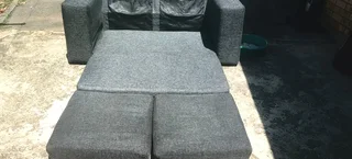 Dark grey 2 seater, sleeper couch for sale
