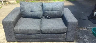 Dark grey 2 seater, sleeper couch for sale