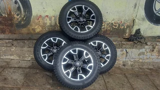 Toyota Legend 50 rims &amp; 265/60R18 General grabber tir. Leave your whatsapp number if interested.