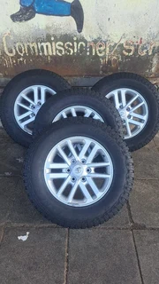 Toyota silver mag &amp; 265/65R17 General grabber . Leave your whatsapp number if interested.