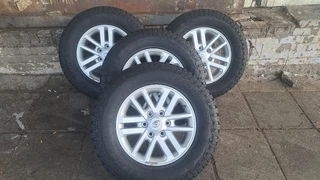 Toyota silver mag &amp; 265/65R17 General grabber . Leave your whatsapp number if interested.
