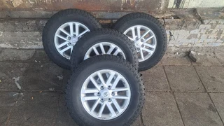 Toyota silver mag &amp; 265/65R17 General grabber . Leave your whatsapp number if interested.