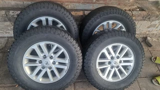 Toyota silver mag &amp; 265/65R17 General grabber . Leave your whatsapp number if interested.
