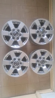 Nissan Np300 hardbody 16 inch mag rims. Leave your whatsapp number if interested.