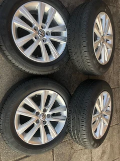 15 inch polo mags &amp; tires of 95% thread left. leave your whatsapp number if interested.