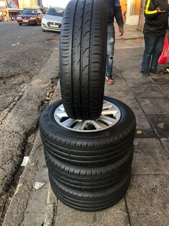 15 inch polo mags &amp; tires of 95% thread left. leave your whatsapp number if interested.