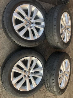 15 inch polo mags &amp; tires of 95% thread left. leave your whatsapp number if interested.