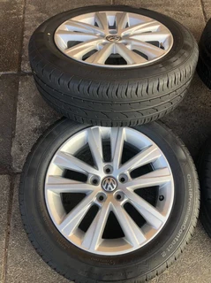 15 inch polo mags &amp; tires of 95% thread left. leave your whatsapp number if interested.