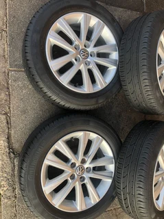15 inch polo mags &amp; tires of 95% thread left. leave your whatsapp number if interested.